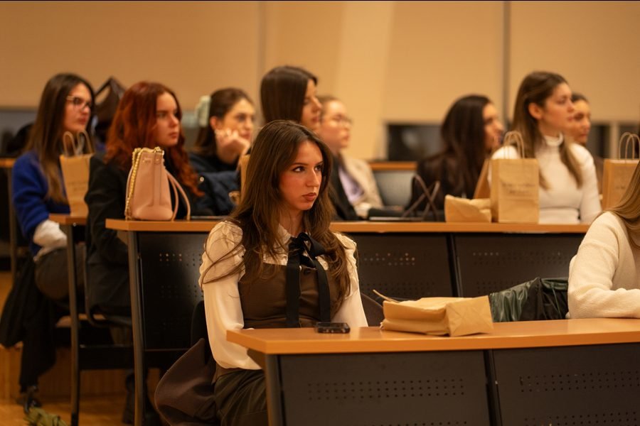 Participants attending a lecture in the hall